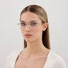 Gucci okulary korekcyjne GG1938O 001 złoto/przezroczyste damskie